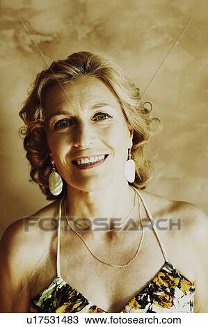 Stock Image - Portrait of a mature woman smiling. Fotosearch