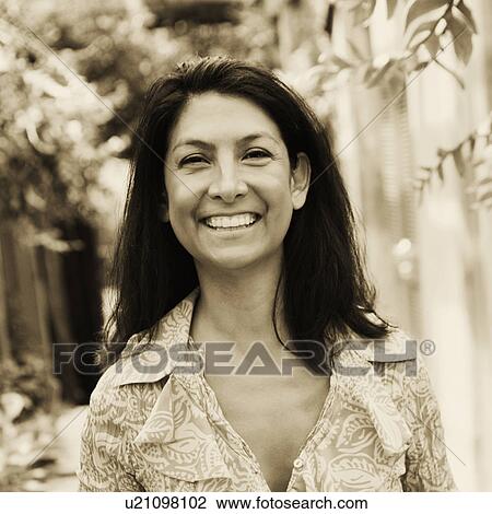 Stock Image - Portrait of a mature woman smiling. Fotosearch