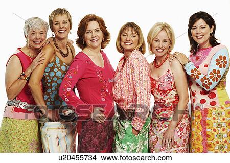Picture - Portrait of a group of mature women standing together and smiling. Fotosearch