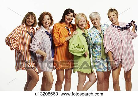 Portrait of a group of mature women standing together and smiling View Large Photo Image Stock Image - Portrait of a group of mature women standing together and smiling. Fotosearch