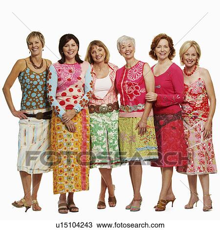 Stock Image - Portrait of a group of mature women standing together and smiling. Fotosearch