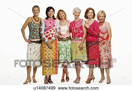 Stock Photo - Portrait of a group of mature women standing together and smiling. Fotosearch