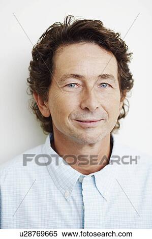 Portrait of a mature man grinning View Large Photo Image Stock Photography - Portrait of a mature man grinning. Fotosearch