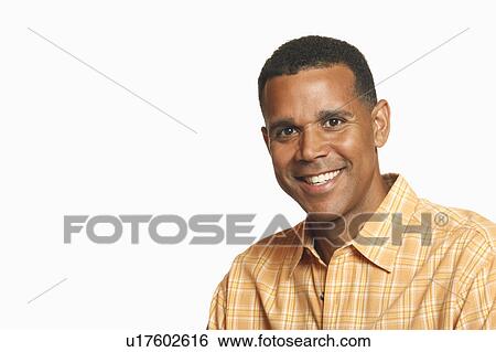 Portrait of a mature man smiling View Large Photo Image Stock Photograph - Portrait of a mature man smiling. Fotosearch