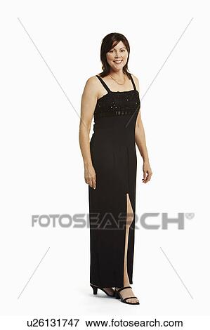 Portrait of a mature woman standing View Large Photo Image Stock Photo - Portrait of a mature woman standing. Fotosearch