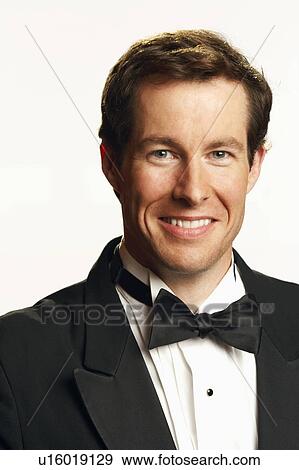 Stock Photo - Portrait of a mid adult man smiling. Fotosearch
