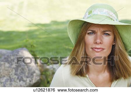 Portrait of a mid adult woman View Large Photo Image Stock Photograph - Portrait of a mid adult woman. Fotosearch