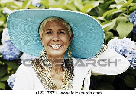 Stock Image - Portrait of a senior woman smiling. Fotosearch