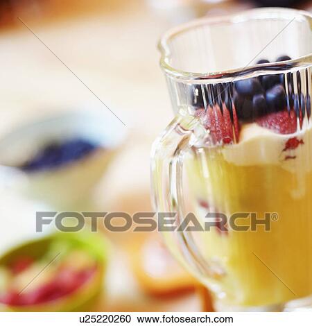 Mango shake in an electric mixer View Large Photo Image Stock Image - Mango shake in an electric mixer. Fotosearch