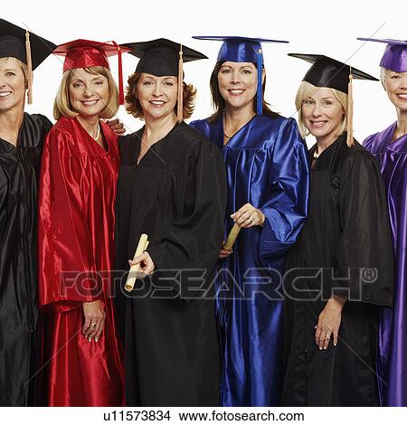 Picture - Portrait of a group of mature women wearing graduation gowns. Fotosearch
