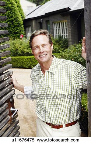 Stock Photography - Portrait of a mature man smiling. Fotosearch