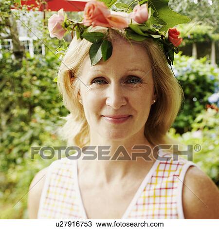 Stock Image - Portrait of a mature woman smiling. Fotosearch