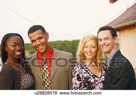Portrait of a mature couple with a mature man and a mid adult woman smiling View Large Photo Image Stock Photo - Portrait of a mature couple with a mature man and a mid adult woman smiling. Fotosearch