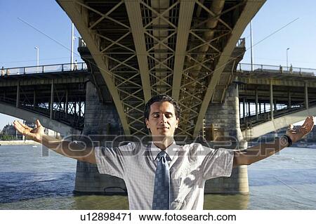 Businessman under a bridge. View Large Photo Image Stock Image - Businessman under a bridge.. Fotosearch