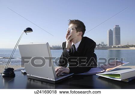 Business man in outdoor office View Large Photo Image Stock Photo - Business man in outdoor office. Fotosearch