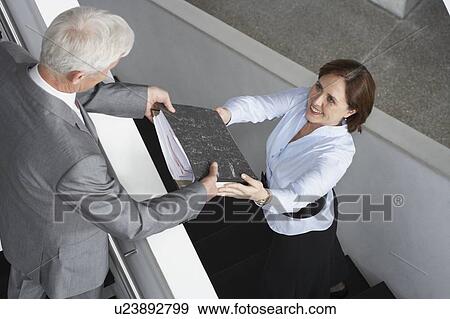 Colleagues on stairs View Large Photo Image Stock Photo - Colleagues on stairs. Fotosearch