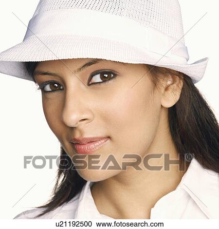 Stock Image - Close-up of a young woman smiling. Fotosearch