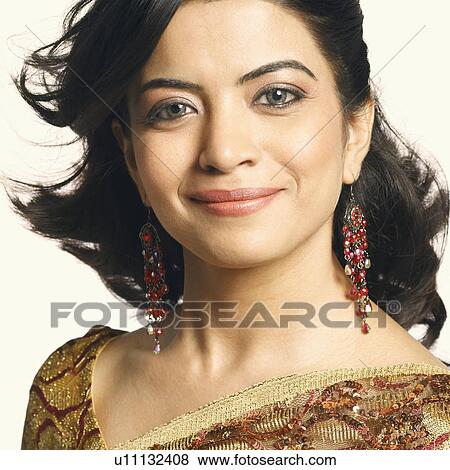 Stock Photo - Close-up of a young woman smiling. Fotosearch