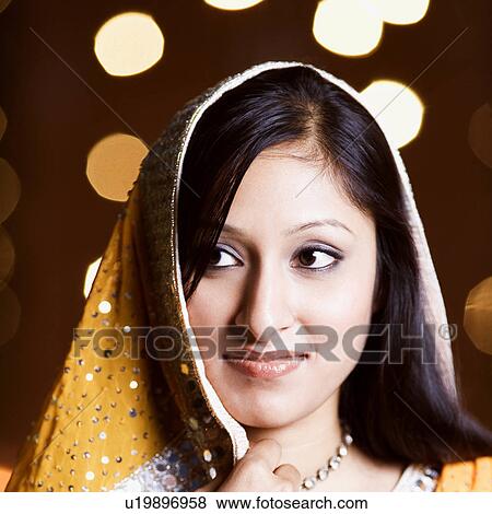 Close-up of a young woman View Large Photo Image Stock Photo - Close-up of a young woman. Fotosearch