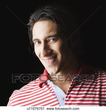 Portrait of a young man smiling View Large Photo Image Stock Image - Portrait of a young man smiling. Fotosearch