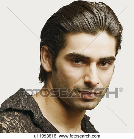 Portrait of a young man View Large Photo Image Stock Photograph - Portrait of a young man. Fotosearch