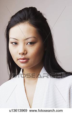 Stock Photo - Portrait of a young woman. Fotosearch