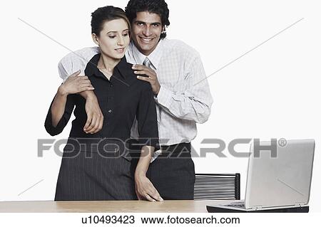 Portrait of a businessman standing with a businesswoman View Large Photo Image Stock Image - Portrait of a businessman standing with a businesswoman. Fotosearch