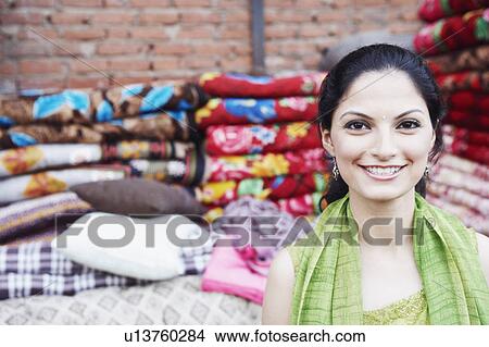 Picture - Portrait of a young woman smiling. Fotosearch