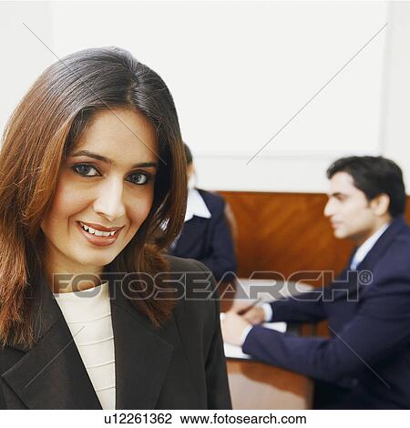 Portrait of a businesswoman smiling View Large Photo Image Stock Image - Portrait of a businesswoman smiling. Fotosearch