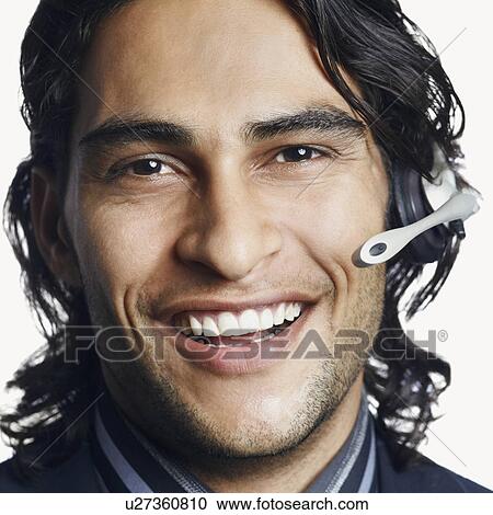 Portrait of a male customer service representative smiling View Large Photo Image Stock Image - Portrait of a male customer service representative smiling. Fotosearch