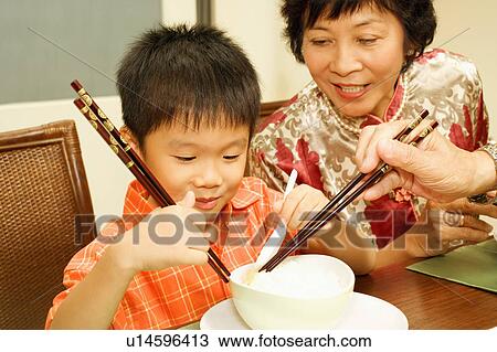 Close-up of a boy and his grandmother View Large Photo Image Stock Image - Close-up of a boy and his grandmother. Fotosearch