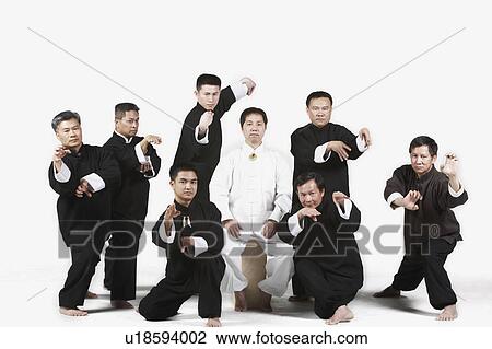 Portrait of a group of people practicing martial arts View Large Photo Image Stock Image - Portrait of a group of people practicing martial arts. Fotosearch