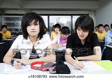 Teenage boy in a classroom View Large Photo Image Stock Image - Teenage boy in a classroom. Fotosearch