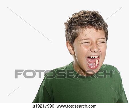 Stock Photograph - Young boy shouting . Fotosearch