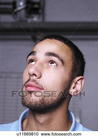 Garage worker standing in shop View Large Photo Image Stock Image - Garage worker standing in shop. Fotosearch