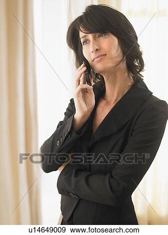Woman with cell phone View Large Photo Image Stock Photo - Woman with cell phone. Fotosearch