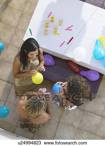 Stock Image - Setting up for a party . Fotosearch