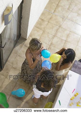 Stock Image - Setting up for a party . Fotosearch