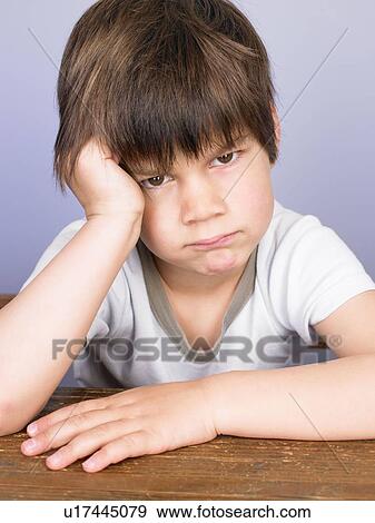 Stock Photo - Boy making a face. Fotosearch