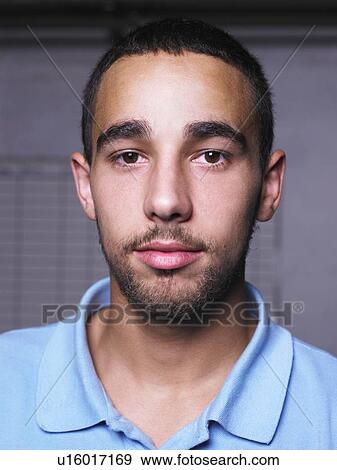 Garage worker standing in shop View Large Photo Image Stock Photo - Garage worker standing in shop. Fotosearch