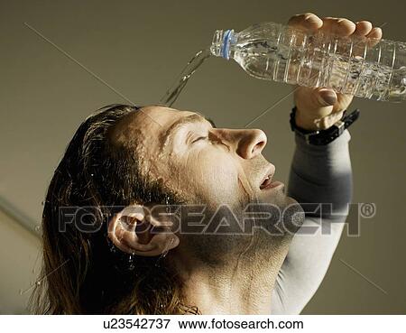 Mature man, pouring water over face View Large Photo Image Stock Photo - Mature man, pouring water over face. Fotosearch