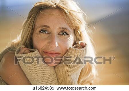 Mature woman relaxing in a gym View Large Photo Image Stock Photography - Mature woman relaxing in a gym. Fotosearch