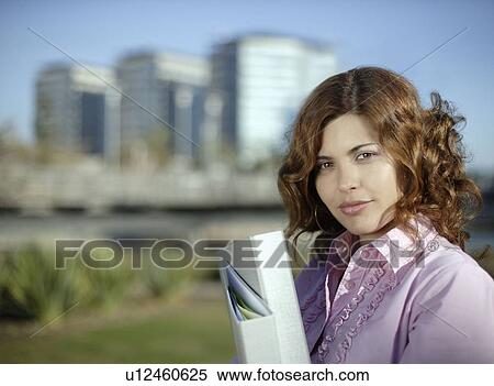 Stock Photography - Portrait of confident business woman. Fotosearch