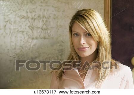 Portrait of young woman View Large Photo Image Stock Photo - Portrait of young woman. Fotosearch