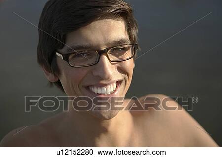 Stock Image - Young Man in glasses.. Fotosearch