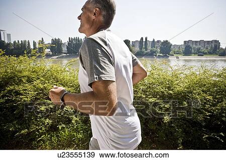 Stock Photo - Man jogging. Fotosearch