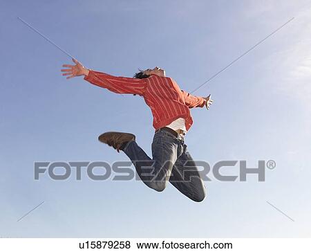 Man jumping View Large Photo Image Stock Photo - Man jumping. Fotosearch