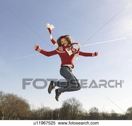 Stock Photography - Woman jumping. Fotosearch