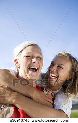 Stock Photography - 2 generations together. Fotosearch
