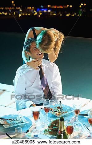 Stock Photography - Man and woman at a party.. Fotosearch